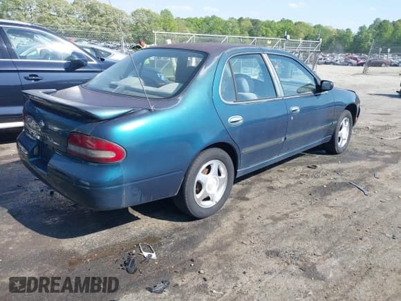 ✅ 1997 Nissan Altima XE • VIN: 1N4BU31D1VC199720 • Lot: 42061192. Listed on IAAI with 312,370 mi. Free auction sales archive from the USA and detailed vehicle history report at DreamBid. Image 4.