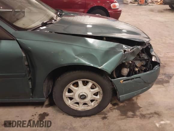 1998 Chevrolet Malibu LS z VIN 1G1NE52M6W6104642, wystawiony jako IAAI lot #41636923 z przebiegiem 116 944 mil mil oraz . Historia ofert i sprzedaży dostępna na DreamBid. Obrazek 12.