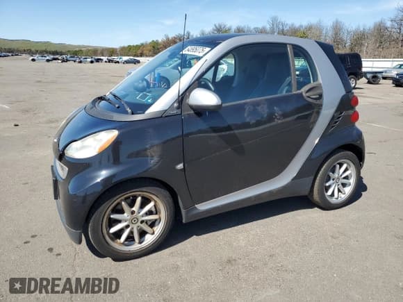 ✅ 2008 Smart fortwo Pure • VIN: WMEEJ31X88K148415 • Lot: 54895075. Listed on Copart with 50,485 mi. Free auction sales archive from the USA and detailed vehicle history report at DreamBid. Image 1.