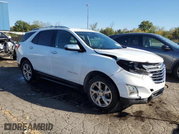 ✅ 2020 Chevrolet Equinox Premier • VIN: 2GNAXNEV4L6136250 • Lot: 84216555. Wystawiony na Copart z przebiegiem 95 757 mil. Bezpłatny archiwum sprzedaży aukcyjnych z USA i szczegółowy raport historii pojazdu na DreamBid. Zdjęcie 4.