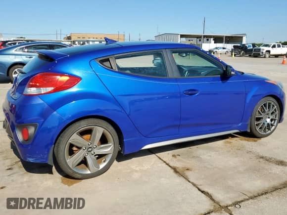 2013 Hyundai Veloster Turbo с VIN KMHTC6AE1DU164742, выставлен на аукционе Copart как лот 56278785 с пробегом 106 522 миль миль и Списание • Salvage title. История ставок и продаж доступна на DreamBid. Изображение 3.