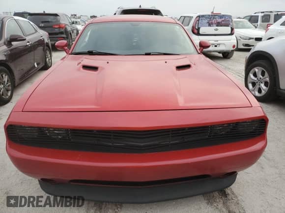 2012 Dodge Challenger SXT z VIN 2C3CDYAG9CH210824, wystawiony jako Copart lot #76201764 z przebiegiem 97 698 mil mil oraz Nie do naprawy • Non repairable. Historia ofert i sprzedaży dostępna na DreamBid. Obrazek 5.