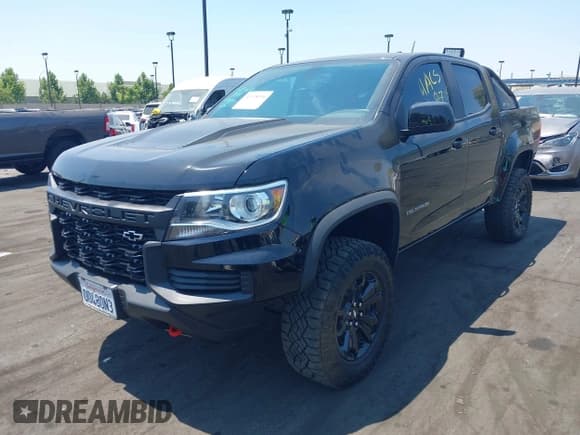✅ 2022 Chevrolet Colorado 4WD ZR2 • VIN: 1GCGTEEN2N1217607 • Лот: 42938996. Опубликован ранее на IAAI с пробегом 24 632 миль. Бесплатный доступ к архиву аукционных продаж из США и подробный отчёт об истории автомобиля на DreamBid. Изображение 2.