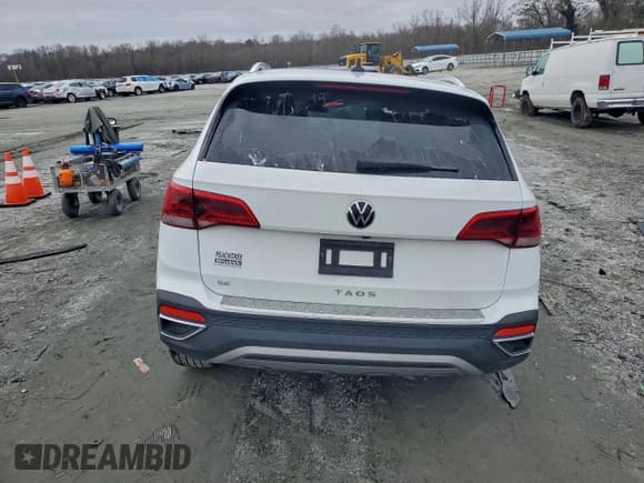 ✅ 2022 Volkswagen Taos SE • VIN: 3VVLX7B2XNM095785 • Lot: 95341615. Listed on Copart with 74,225 mi. Free auction sales archive from the USA and detailed vehicle history report at DreamBid. Image 6.