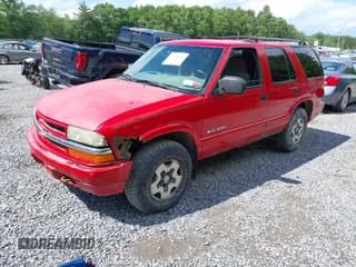 ✅ 2004 Chevrolet Blazer LS • VIN: 1GNDT13X94K142808 • Lot: 42523319. Wystawiony na IAAI z przebiegiem 70 818 mil. Bezpłatny archiwum sprzedaży aukcyjnych z USA i szczegółowy raport historii pojazdu na DreamBid. Zdjęcie 2.