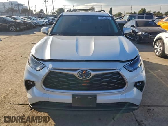 ✅ 2023 Toyota Highlander Hybrid LE • VIN: 5TDZARAHXPS521120 • Лот: 95034905. Опубликован ранее на Copart с пробегом 86 264 миль. Бесплатный доступ к архиву аукционных продаж из США и подробный отчёт об истории автомобиля на DreamBid. Изображение 5.