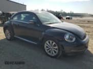 ✅ 2015 Volkswagen Beetle 2.0L TDI • VIN: 3VWJA7AT4FM646759 • Lot: 63477564. Listed on Copart with 94,567 mi. Free auction sales archive from the USA and detailed vehicle history report at DreamBid. Image 4.
