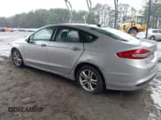 ✅ 2018 Ford Fusion SE • VIN: 3FA6P0H70JR179414 • Лот: 43877600. Опубликован ранее на IAAI с пробегом 153 151 миль. Бесплатный доступ к архиву аукционных продаж из США и подробный отчёт об истории автомобиля на DreamBid. Изображение 3.