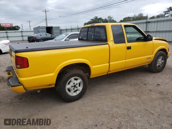 2003 Chevrolet S-10 LS z VIN 1GCDT19X738170604, wystawiony jako Copart lot #71738764 z przebiegiem Nie podano mil oraz Szkoda całkowita • Salvage title. Historia ofert i sprzedaży dostępna na DreamBid. Obrazek 3.