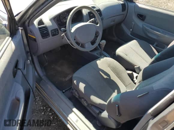 2005 Hyundai Accent GLS с VIN KMHCG35C65U331867, выставлен на аукционе Copart как лот 49637495 с пробегом 63 901 миль миль и Чистый • Clean title. История ставок и продаж доступна на DreamBid. Изображение 8.