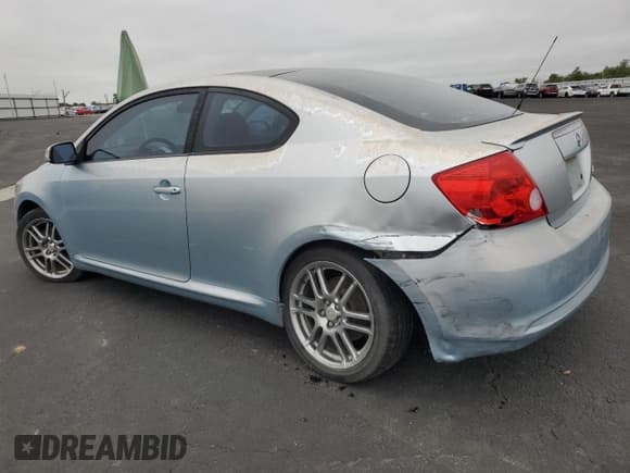 ✅ 2005 Scion tC • VIN: JTKDE177X50020719 • Лот: 82787455. Опубликован ранее на Copart с пробегом 230 373 миль. Бесплатный доступ к архиву аукционных продаж из США и подробный отчёт об истории автомобиля на DreamBid. Изображение 2.