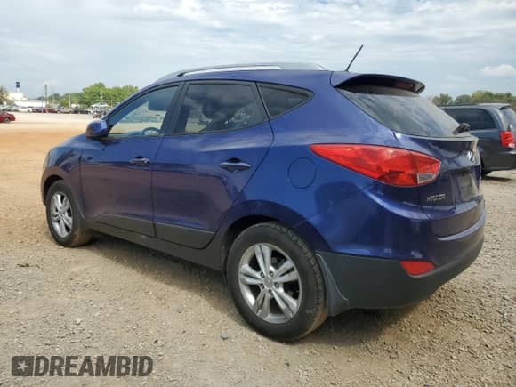 2011 Hyundai Tucson Limited z VIN KM8JU3AC8BU257370, wystawiony jako Copart lot #73105354 z przebiegiem 185 629 mil mil oraz Czysty tytuł • Clean title. Historia ofert i sprzedaży dostępna na DreamBid. Obrazek 2.