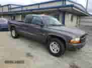 2002 Dodge Dakota z VIN 1B7GL12X22S589971, wystawiony jako Copart lot #79740174 z przebiegiem 183 718 mil mil oraz Czysty tytuł • Clean title. Historia ofert i sprzedaży dostępna na DreamBid. Obrazek 4.