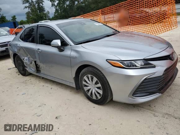 2021 Toyota Camry Hybrid LE with VIN 4T1C31AK7MU562031, listed as a Copart auction lot 71506375 with 82,877 mi miles and Salvage title. Bid and sale history available at DreamBid. Image 4.