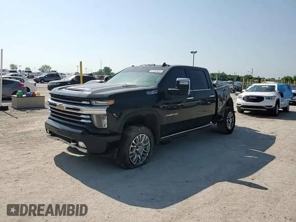 2022 Chevrolet Silverado 2500HD High Country с VIN 2GC4YREY3N1223240, выставлен на аукционе Copart как лот 61905925 с пробегом 137 446 миль миль и На запчасти • Non repairable. История ставок и продаж доступна на DreamBid. Изображение 13.