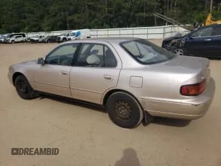 ✅ 1996 Toyota Camry DX • VIN: JT2BG12K6T0415345 • Лот: 67284694. Опубликован ранее на Copart с пробегом 153 512 миль. Бесплатный доступ к архиву аукционных продаж из США и подробный отчёт об истории автомобиля на DreamBid. Изображение 2.