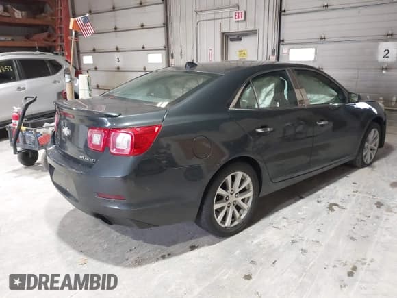 ✅ 2014 Chevrolet Malibu LTZ • VIN: 1G11H5SL7EF132977 • Lot: 43489929. Listed on IAAI with 144,561 mi. Free auction sales archive from the USA and detailed vehicle history report at DreamBid. Image 4.