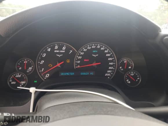 2008 Chevrolet Corvette с VIN 1G1YY26W985118431, выставлен на аукционе Copart как лот 73733624 с пробегом 80 829 миль миль и Списание • Salvage title. История ставок и продаж доступна на DreamBid. Изображение 9.