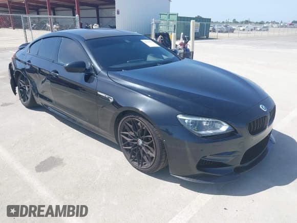 ✅ 2014 BMW M6 • VIN: WBS6C9C52EDV73651 • Lot: 42110470. Listed on IAAI with 127,576 mi. Free auction sales archive from the USA and detailed vehicle history report at DreamBid. Image 1.