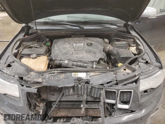 ✅ 2015 Jeep Grand Cherokee Overland • VIN: 1C4RJFCM8FC815544 • Lot: 80519904. Listed on Copart with 132,490 mi. Free auction sales archive from the USA and detailed vehicle history report at DreamBid. Image 12.