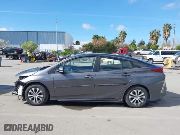 ✅ 2022 Toyota Prius LE • VIN: JTDKAMFP7N3206830 • Lot: 41984239. Listed on IAAI with 57,681 mi. Free auction sales archive from the USA and detailed vehicle history report at DreamBid. Image 14.