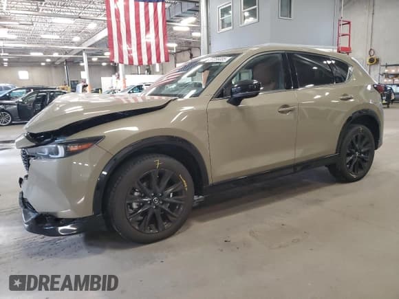 ✅ 2024 Mazda CX-5 Carbon Edition • VIN: JM3KFBAY0R0486983 • Lot: 87256005. Listed on Copart with 22,960 mi. Free auction sales archive from the USA and detailed vehicle history report at DreamBid. Image 1.