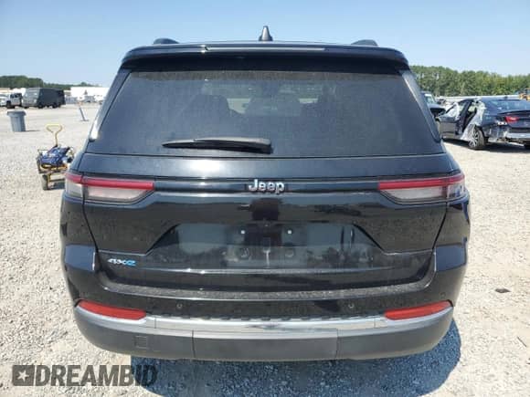 2023 Jeep Grand Cherokee with VIN 1C4RJYB65PC626141, listed as a Copart auction lot 71496755 with 65,403 mi miles and Salvage title. Bid and sale history available at DreamBid. Image 6.