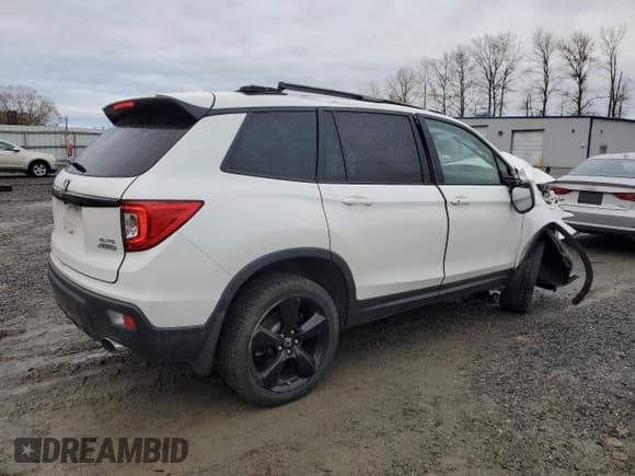 ✅ 2019 Honda Passport Elite • VIN: 5FNYF8H0XKB003951 • Lot: 93491105. Listed on Copart with Not provided. Free auction sales archive from the USA and detailed vehicle history report at DreamBid. Image 3.