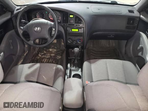 2006 Hyundai Elantra z VIN KMHDM45D66U356412, wystawiony jako Copart lot #81612314 z przebiegiem 56 501 mil mil oraz Nie do naprawy • Non repairable. Historia ofert i sprzedaży dostępna na DreamBid. Obrazek 8.