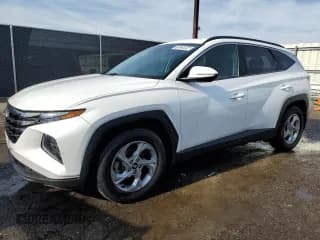✅ 2022 Hyundai Tucson SEL • VIN: 5NMJB3AE6NH038947 • Lot: 76929594. Wystawiony na Copart z przebiegiem 88 326 mil. Bezpłatny archiwum sprzedaży aukcyjnych z USA i szczegółowy raport historii pojazdu na DreamBid. Zdjęcie 1.