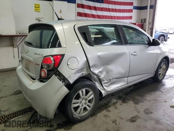 2013 Chevrolet Sonic LT с VIN 1G1JD6SB6D4254801, выставлен на аукционе Copart как лот 86626614 с пробегом 111 067 миль миль и Списание • Salvage title. История ставок и продаж доступна на DreamBid. Изображение 3.