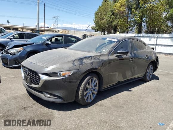 ✅ 2021 Mazda 3 Preferred • VIN: JM1BPBCL9M1346280 • Lot: 70478125. Listed on Copart with 65,534 mi. Free auction sales archive from the USA and detailed vehicle history report at DreamBid. Image 1.
