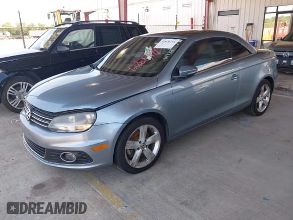 ✅ 2012 Volkswagen Eos Executive • VIN: WVWFW7AH6CV012831 • Lot: 42820714. Listed on IAAI with 148,639 mi. Free auction sales archive from the USA and detailed vehicle history report at DreamBid. Image 2.