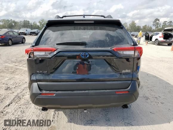 ✅ 2024 Toyota RAV4 Hybrid Woodland • VIN: 2T3UWRFV0RW196781 • Лот: 93951615. Опубликован ранее на Copart с пробегом 37 849 миль. Бесплатный доступ к архиву аукционных продаж из США и подробный отчёт об истории автомобиля на DreamBid. Изображение 6.