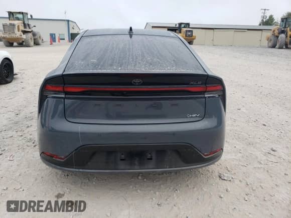 2023 Toyota Prius LE с VIN JTDACAAU9P3003815, выставлен на аукционе Copart как лот 69556365 с пробегом 60 912 миль миль и Списание • Salvage title. История ставок и продаж доступна на DreamBid. Изображение 6.