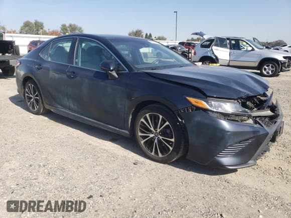 ✅ 2018 Toyota Camry SE • VIN: 4T1B11HK3JU598365 • Lot: 89561565. Listed on Copart with 99,371 mi. Free auction sales archive from the USA and detailed vehicle history report at DreamBid. Image 4.