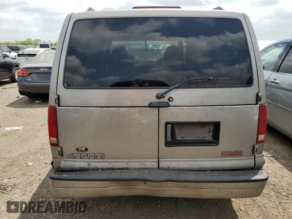 ✅ 2001 GMC Safari • VIN: 1GKDM19W81B517169 • Lot: 56639605. Wystawiony na Copart z przebiegiem 240 227 mil. Bezpłatny archiwum sprzedaży aukcyjnych z USA i szczegółowy raport historii pojazdu na DreamBid. Zdjęcie 6.