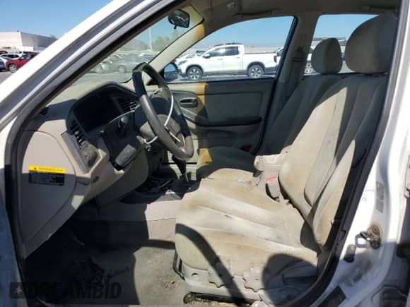 2003 Hyundai Elantra GLS с VIN KMHDN45D13U582382, выставлен на аукционе Copart как лот 61249684 с пробегом Не указан миль и Списание • Salvage title. История ставок и продаж доступна на DreamBid. Изображение 7.