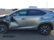 ✅ 2015 Lexus NX 200t • VIN: JTJBARBZ2F2002932 • Лот: 41797857. Опубликован ранее на IAAI с пробегом 205 902 миль. Бесплатный доступ к архиву аукционных продаж из США и подробный отчёт об истории автомобиля на DreamBid. Изображение 14.