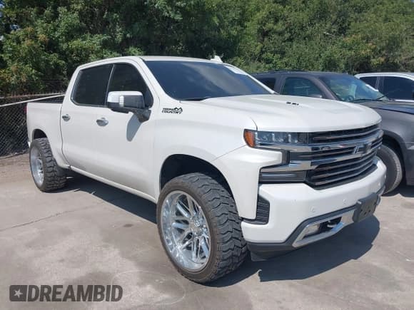 ✅ 2019 Chevrolet Silverado 1500 High Country • VIN: 3GCUYHEL4KG127750 • Lot: 43215730. Wystawiony na IAAI z przebiegiem 100 824 mil. Bezpłatny archiwum sprzedaży aukcyjnych z USA i szczegółowy raport historii pojazdu na DreamBid. Zdjęcie 1.