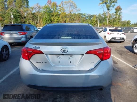✅ 2018 Toyota Corolla LE • VIN: 5YFBURHE6JP827476 • Lot: 43265766. Listed on IAAI with 135,859 mi. Free auction sales archive from the USA and detailed vehicle history report at DreamBid. Image 17.