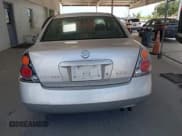 ✅ 2002 Nissan Altima S • VIN: 1N4AL11DX2C700957 • Lot: 43058667. Wystawiony na IAAI z przebiegiem 218 118 mil. Bezpłatny archiwum sprzedaży aukcyjnych z USA i szczegółowy raport historii pojazdu na DreamBid. Zdjęcie 16.