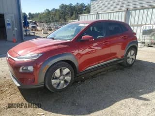 ✅ 2021 Hyundai Kona Ultimate • VIN: KM8K53AG5MU130499 • Лот: 90047745. Опубликован ранее на Copart с пробегом 107 209 миль. Бесплатный доступ к архиву аукционных продаж из США и подробный отчёт об истории автомобиля на DreamBid. Изображение 1.