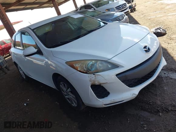 ✅ 2012 Mazda 3 i Touring • VIN: JM1BL1L8XC1660102 • Lot: 42398247. Listed on IAAI with 175,043 mi. Free auction sales archive from the USA and detailed vehicle history report at DreamBid. Image 1.