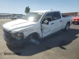 2023 Ram 1500 Tradesman z VIN 1C6RRENT0PN693234, wystawiony jako Copart lot #61307425 z przebiegiem 6 302 mil mil oraz Szkoda całkowita • Salvage title. Historia ofert i sprzedaży dostępna na DreamBid. Obrazek 1.