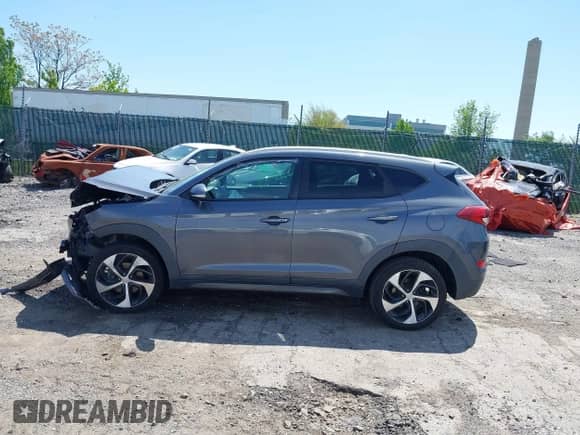 2016 Hyundai Tucson Sport with VIN KM8J3CA28GU126098, listed as a IAAI auction lot 42149751 with Not provided miles and . Bid and sale history available at DreamBid. Image 14.