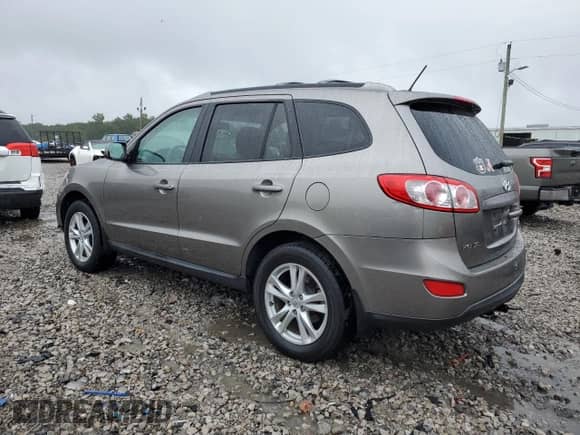 2011 Hyundai Santa Fe SE с VIN 5XYZH4AG3BG017231, выставлен на аукционе Copart как лот 73151374 с пробегом 202 523 миль миль и Списание • Salvage title. История ставок и продаж доступна на DreamBid. Изображение 2.