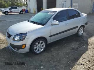✅ 2007 Kia Rio LX • VIN: KNADE123976235274 • Lot: 78868964. Listed on Copart with 171,909 mi. Free auction sales archive from the USA and detailed vehicle history report at DreamBid. Image 1.