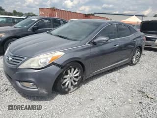 ✅ 2012 Hyundai Azera • VIN: KMHFH4JG7CA014039 • Лот: 71280805. Опубликован ранее на Copart с пробегом 165 940 миль. Бесплатный доступ к архиву аукционных продаж из США и подробный отчёт об истории автомобиля на DreamBid. Изображение 1.