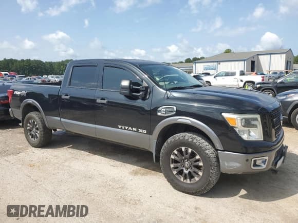 ✅ 2016 Nissan Titan Platinum Reserve • VIN: 1N6BA1F40GN512437 • Lot: 63521325. Wystawiony na Copart z przebiegiem 203 879 mil. Bezpłatny archiwum sprzedaży aukcyjnych z USA i szczegółowy raport historii pojazdu na DreamBid. Zdjęcie 4.